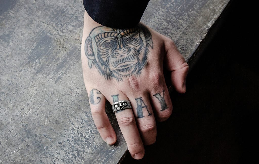 monkey tattoo on a hand